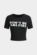 Braelyn™ | Schwarz Kurzarm Cropped T-Shirt mit "Wees Niet Jalours"-Print
